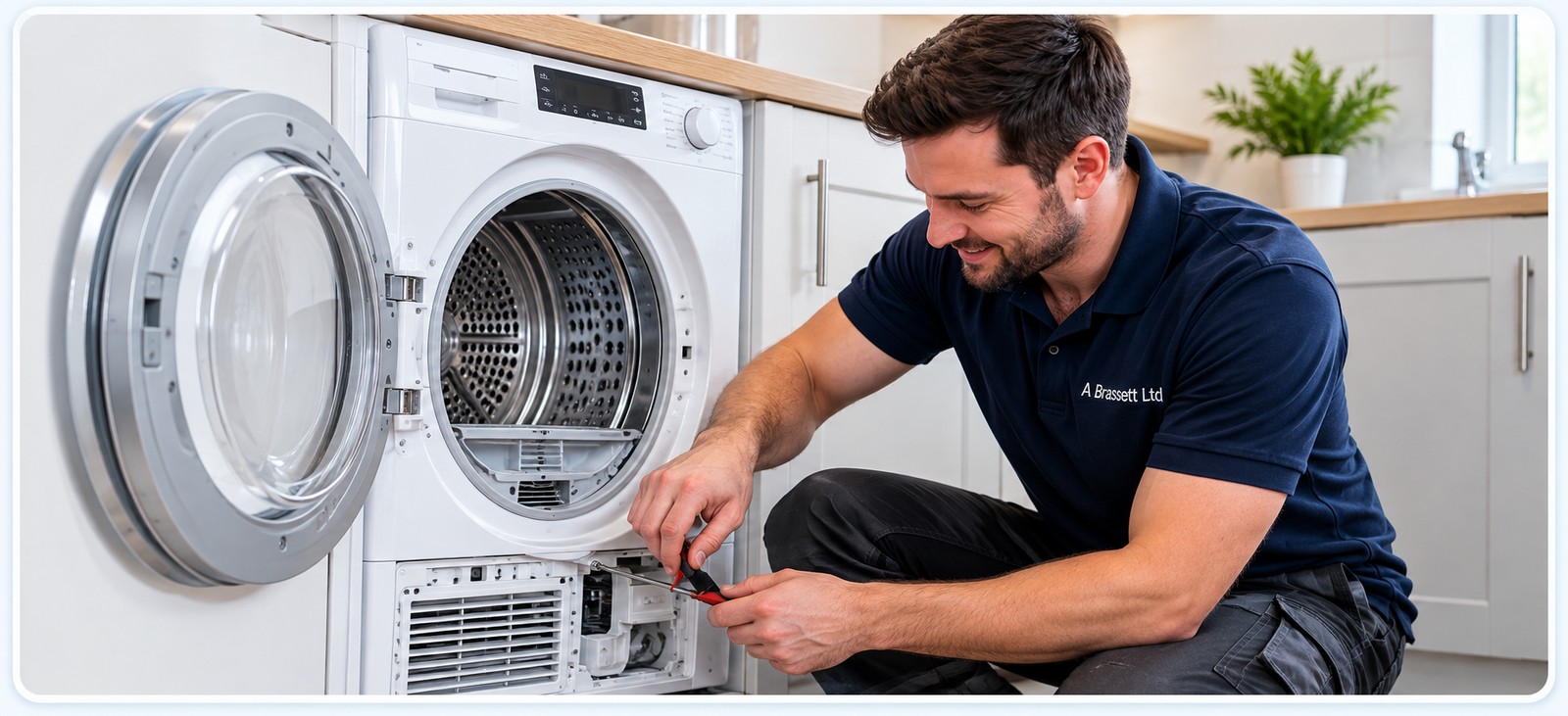 A Brassett Ltd engineer working on a tumble dryer